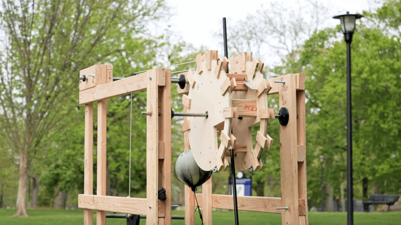 A trebuchet — a medieval weapon which relies on a counterweight and gravity to release.
