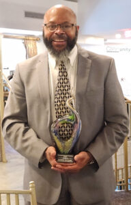 Marion McClary with Changemaker Award