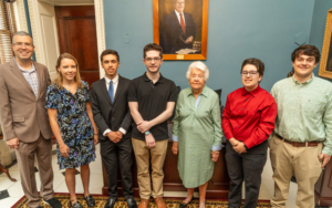 President Avaltroni and Gail Mertz with Mertz Scholars.