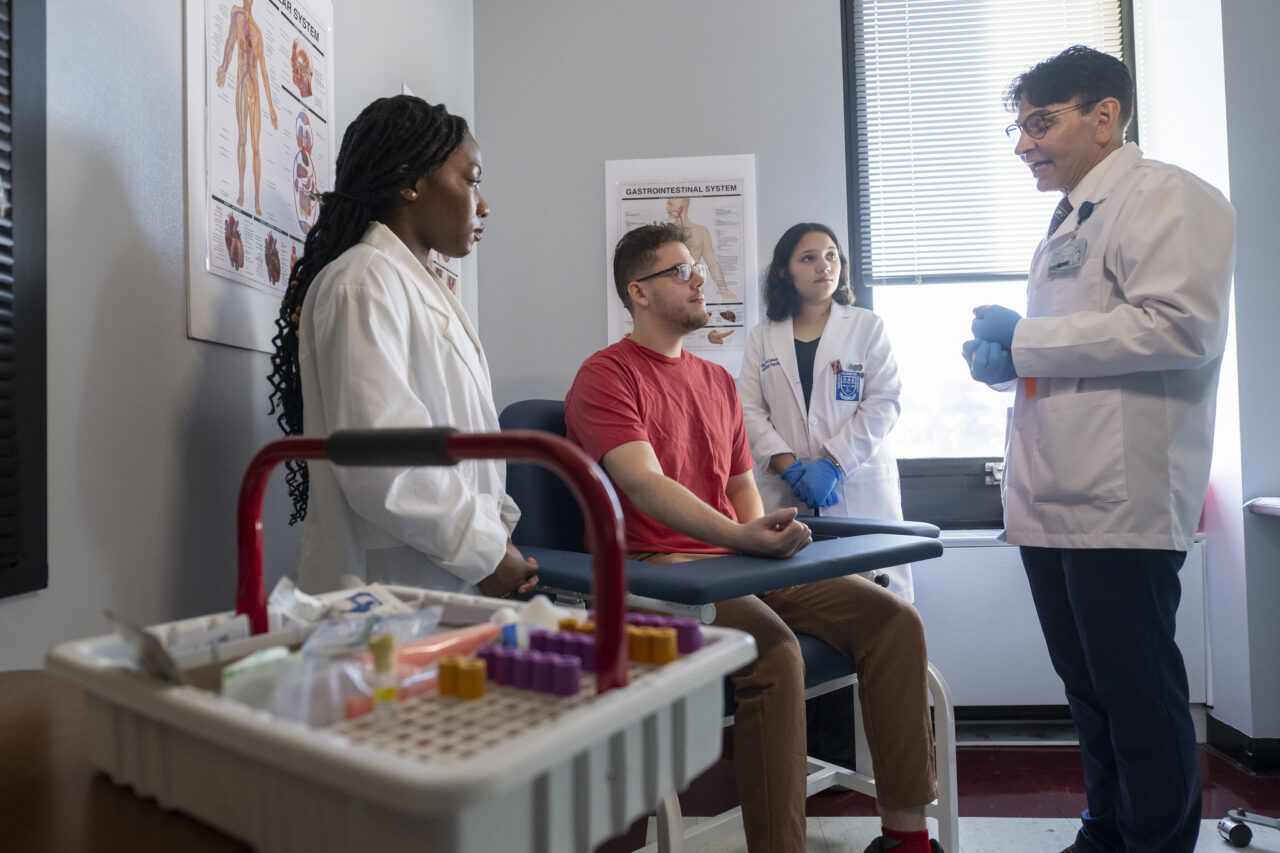 Nursing students practice their skills.