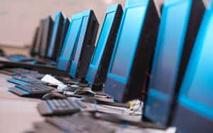 A bank of computers in a computer lab.