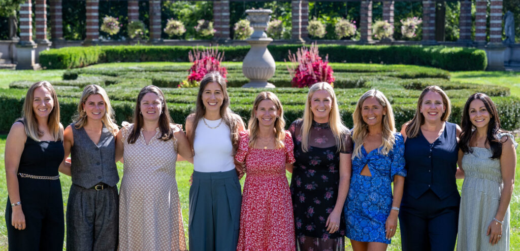 Nine women in the Italian Gardens at the Florham Campus