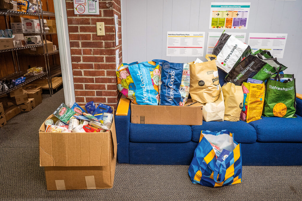 Boxes and bags of food await unloading at the Florham Campus food pantry.