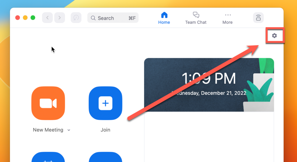 Screenshot of the Zoom desktop application on macOS showing the Home tab, with a red box and arrow highlighting the Settings (gear) icon in the upper right corner. The main area shows buttons for New Meeting and Join, along with a clock displaying 1:09 PM on Wednesday, December 21, 2022.