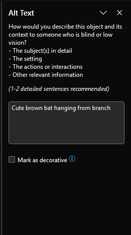 Excel Alt Text dialog box showing guidance for describing objects to users who are blind or have low vision. The panel displays instructions recommending 1-2 detailed sentences covering the subject in detail, setting, actions or interactions, and other relevant information. A text field contains the example "Cute brown bat hanging from branch" with a "Mark as decorative" checkbox option below it.