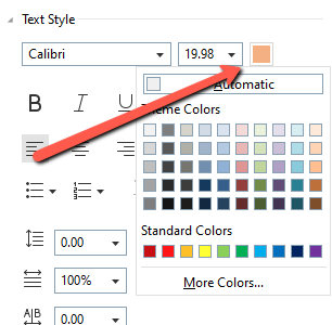Screenshot of the Foxit Text Style panel with a color picker open, showing Theme Colors and Standard Colors swatches. A red arrow points to the color swatch button near the top of the panel, next to the font size field showing "19.98" and font set to "Calibri." A "More Colors…" option is visible at the bottom of the color picker.