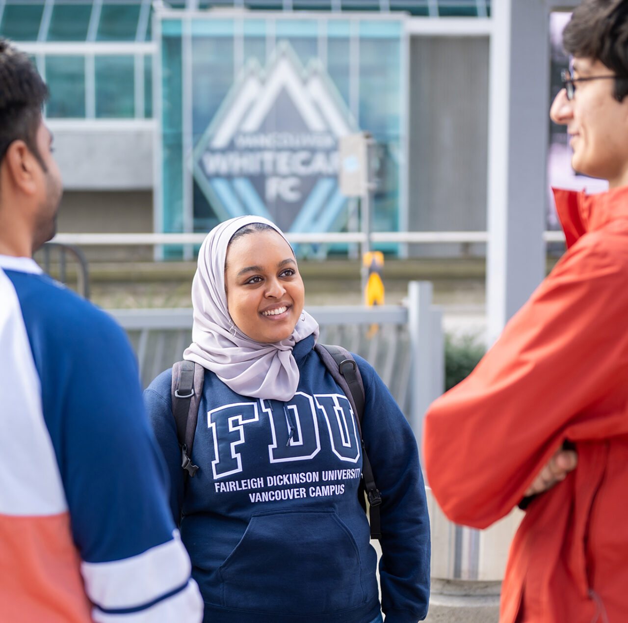 three FDU students talking