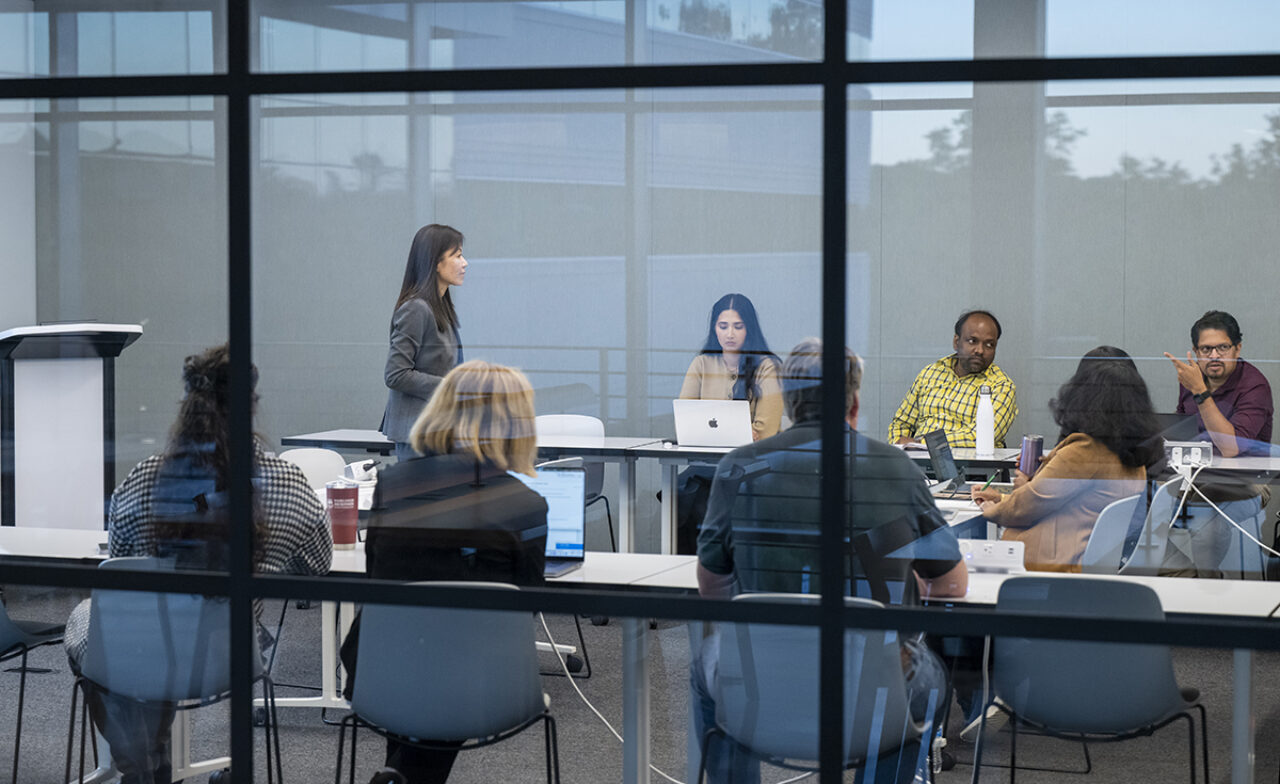 Students and teacher in modern FDU classroom