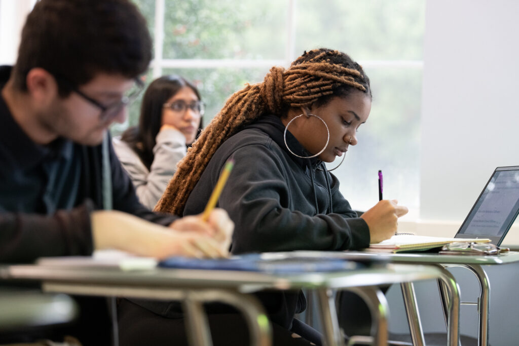 Students taking notes