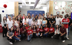 Group photo featuring alumni, faculty, and staff